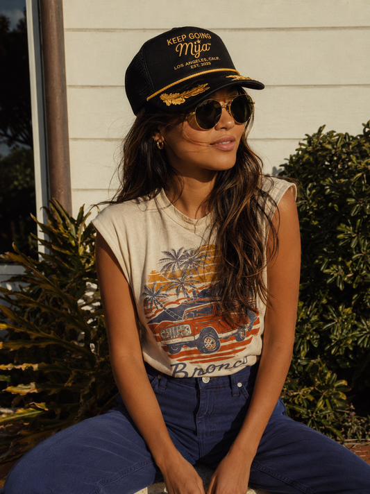 Keep Going, Mija™ Trucker Hat – Black & Gold Embroidered Snapback Cap